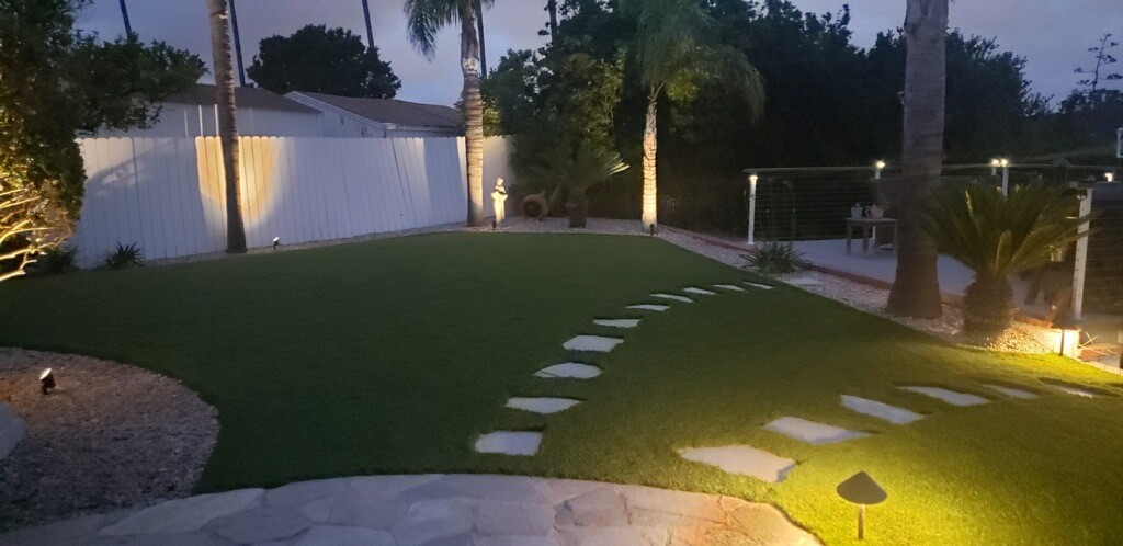 Drought-tolerant landscape design with decorative rock in San Diego